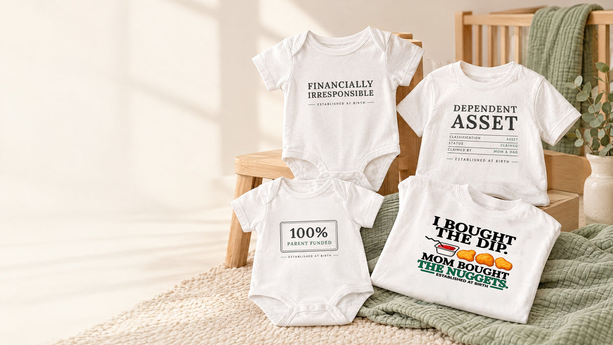 Fiscal Casual Junior hero V5 — nursery flat-lay, Nuggets tee print fixed (contained, panel angle, fabric shading)